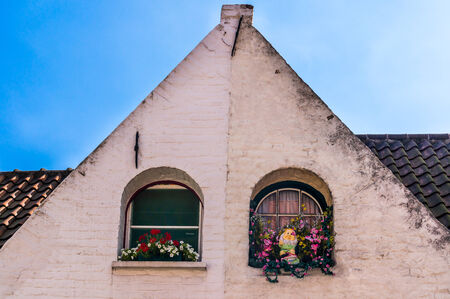 Bruges windows and triangular architecture.の写真素材