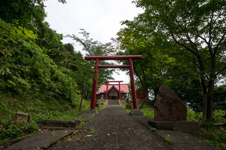 Japanese red shinto shrine by the coast in Shakotan  Taken during summer in Hokkaido, Japan のeditorial素材