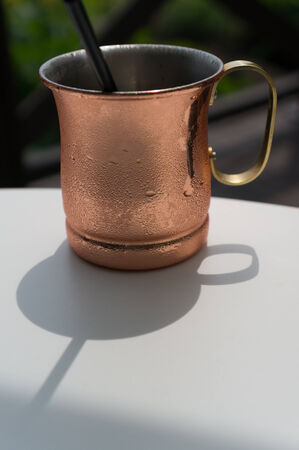bronze coffee mug in a cafe  Taken in Biei, Japanの写真素材