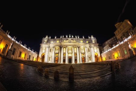 Saint Peter's Plaza and the basilica taken at night with the fisheyesの写真素材