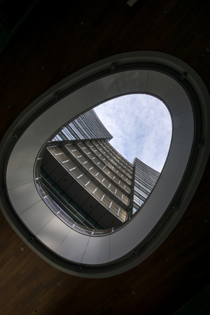 Unicredit tower skyscraper taken from Gae Aulenti Square in Milan, Italy.の写真素材