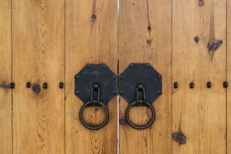 wonseo dong traditional wooden door knob of a traditional hanok gate. Taken in Seoul, South Koreaの写真素材