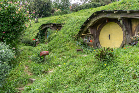 hobbit holes and hobbit garden in hobbiton movie set, new zealand. Taken during summer.のeditorial素材