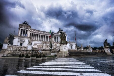 Altar of the Fatherland taken under a stormy sky in the morning. The famous landmark is lcoated in...