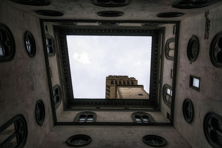 Looking up the Vecchio plaza courtyard in Florence, Italy.