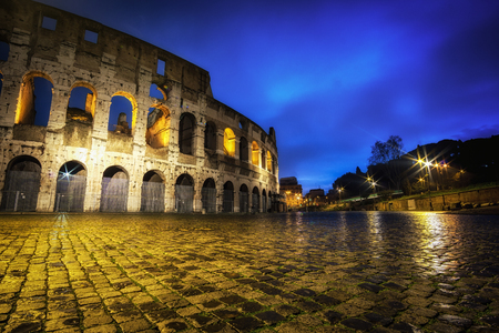 Famous Colosseum taken at night when the structure is still lit up.の写真素材