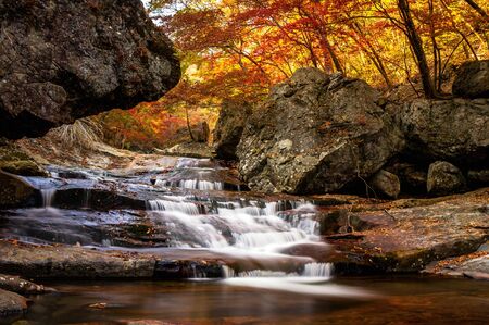 Cascading waterfall in Jiri Mountain in South Korea during the autumn season.の写真素材