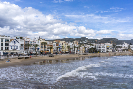 View of Sitges beach with beach front promenade. Catalonia, Spain.の写真素材