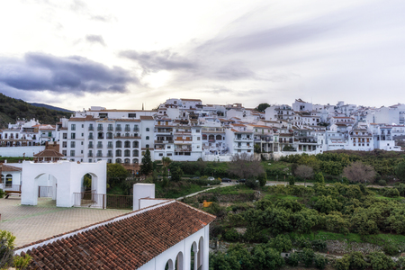 Sunrise over the white colored village of Frigiliana in Spain. Narrow streets and alleyways surrounded by white colored houses.の写真素材
