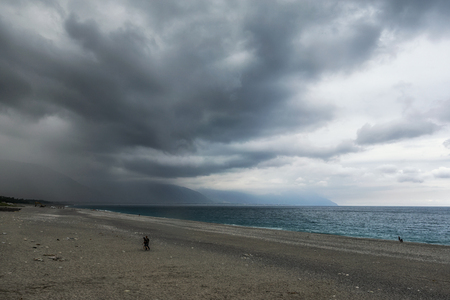 Chisingtan Scenic Area beach coastal view taken under a stormy sky. Hualien, Taiwan.の写真素材