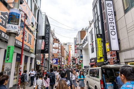busy crowded shibuya street with various shops and establishments. Shibuya, Tokyo, Japan. Taken on June 28th 2019のeditorial素材