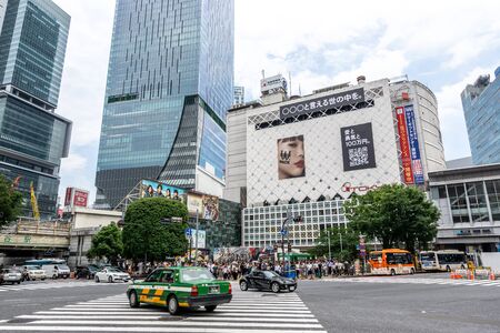 view of tall skyscraper buildings from streets of shibuya, tokyo, japan. Taken on June 28th 2019のeditorial素材
