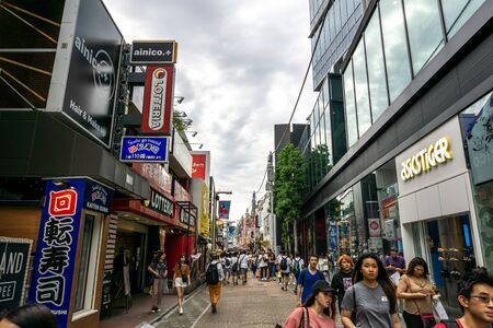 busy harajuku takeshita street taken during summer day with many shops and restaurants. Tokyo, Japan. June 28th 2019のeditorial素材