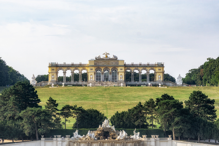 the view of gloriette and the neptune fountain in the schonbrunn palace gardens in vienna, austria.のeditorial素材