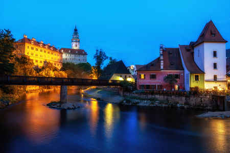 cesky krumlov castle and the town night reflections on the Vltava river. Famous tourist landmark in Czech Republic.のeditorial素材