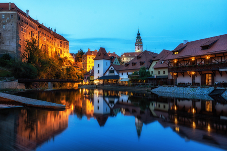 cesky krumlov castle and the town night reflections on the Vltava river. Famous tourist landmark in Czech Republic.のeditorial素材