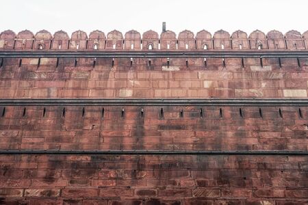 red fort fortress wall and surrounding moat. Red fort is a famous landmark in New Delhi, India.