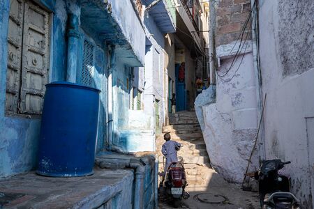 blue painted houses in the streets of jodhpur also called the blue city in Rajasthan, India. Taken...