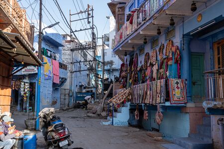 blue painted houses in the streets of jodhpur also called the blue city in Rajasthan, India. Taken...