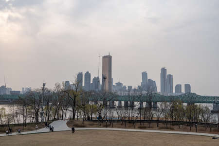 nodeul island park complex scenery with the view of 63 building in the distance.