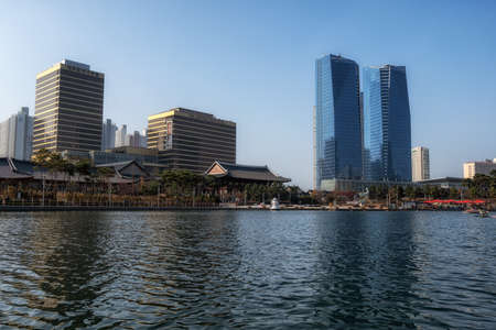 The view of various hotels and buildings from Songdo central park lake. Taken in Songdo, IncheonSouth Korea. on November 14th 2020のeditorial素材