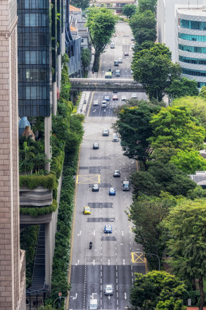 Cars driving through the traffic in a business district in Singapore. Taken on October 10th 2022のeditorial素材