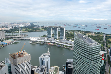The view of Marina Bay Sands hotel from top of a skyscraper nearby. Famous iconic landmark in Singapore. Taken on October 10th 2022のeditorial素材
