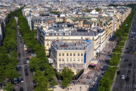 The view of Avenue des Champs Elysees from top of Arc de Triomphe. Famous luxury shopping road in Paris, France. Taken on June 15 2023のeditorial素材