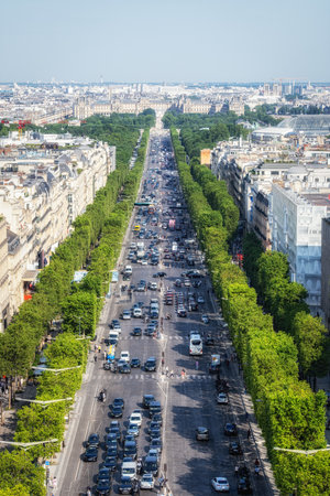 The view of Avenue des Champs Elysees from top of Arc de Triomphe. Famous luxury shopping road in Paris, France. Taken on June 15 2023のeditorial素材