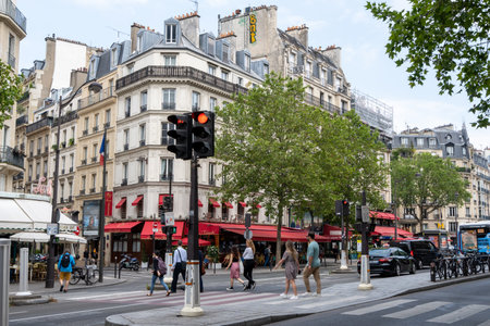 Paris street light view with a local shop nearby. Taken on the streets of Paris, France on June 13 2023のeditorial素材