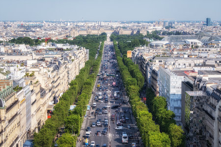 The view of Avenue des Champs Elysees from top of Arc de Triomphe. Famous luxury shopping road in Paris, France. Taken on June 15 2023のeditorial素材