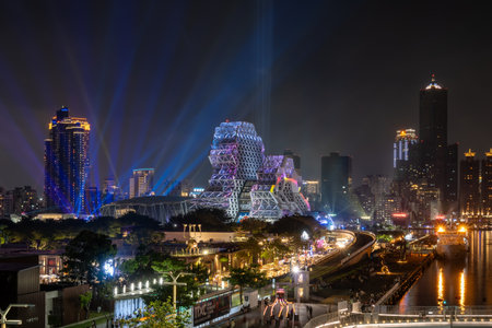 Kaohsiung Music Center at night illuminated by laser light shows. Taken from Pier 2 Art Center in Kaohsiung, Taiwan, TAken on October 7th 2023のeditorial素材