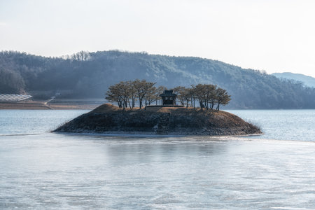 A small shrine built on an island in Ansan Lake in front of Dosan Seowon Confucian Academy in Andong, South Koreaの写真素材