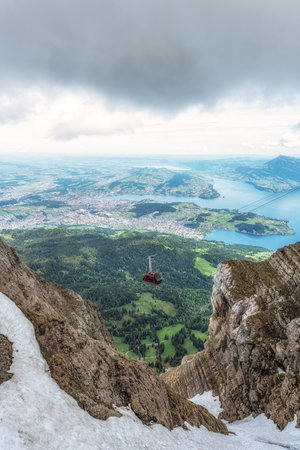The view of Pilatus cable car ride and cableway also called dragon ride. Taken from Mount PIlatus,...