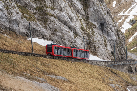 Cogwheel train in Mount PIlatus which is considered steepest in the world. Taken from top of Mount PIlatus, Switzerlandの写真素材