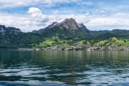 The view of mount pilatus mountain tops while on a boat cruise in Lake Lucerne. Taken in Luzern, Switzerlandの写真素材