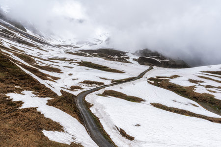 Grindelwald first snow covered summit top. Mountain and hill tops covered in snow near the First...
