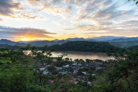View of sunset over the mekong river and Luang Prabang taken from Phousi Hill. Famous tourist destination in Luang Prabang, Laosの写真素材