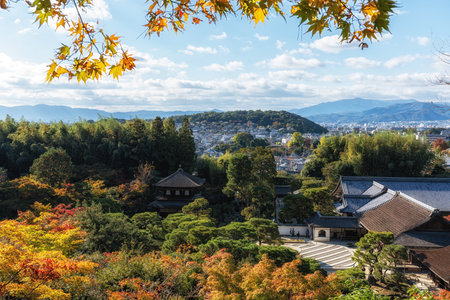 Ginkakuji Higashiyama Jishoji temple and Togudo with the view of Kyoto in the distance captured from the nearby observation deck during autumn foliage season. Famous landmark shinto temple in Kyoto, Japanの写真素材