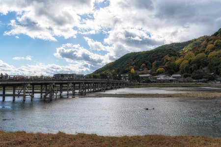 Togetsukyo bridge over Katsura River taken during autumn foliage season. Arashiyama, Kyoto, Japanの写真素材