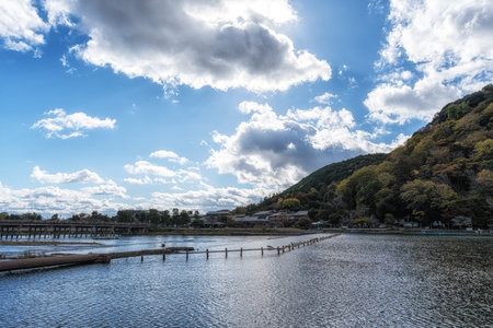 Togetsukyo bridge over Katsura River taken during autumn foliage season. Arashiyama, Kyoto, Japanの写真素材