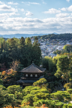 Ginkakuji Higashiyama Jishoji temple and Togudo with the view of Kyoto in the distance captured from the nearby observation deck during autumn foliage season. Famous landmark shinto temple in Kyoto, Japanの写真素材
