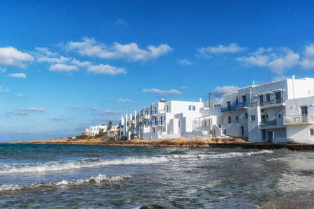 Naousa Beach and surrounding white color painted houses. Famous tourist attraction in Paros Island, Greeceの写真素材