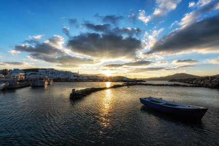 Sunset view over Naousa Marina in Paros taken during winter season. Famous iconic tourist village in Paros, Greeceの写真素材