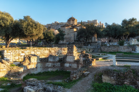Ancient Agora of Athens Greece captured during sunset hours with the view of Acropolis in the distanceの写真素材