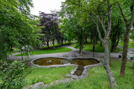 Alesund byparken local city park fountain view. Taken in Alesund, Norwayの写真素材