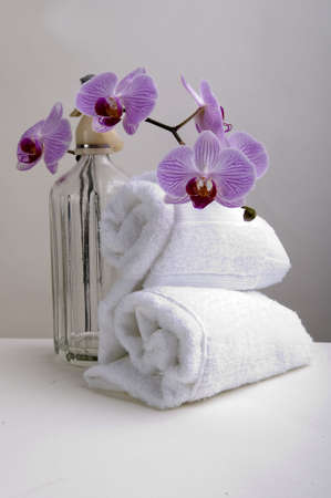 Towels, orchids and soda on luxury spaの写真素材