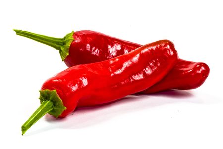 chilli peppers on white backgroundの写真素材