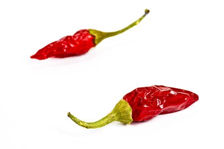chilli peppers on white backgroundの写真素材