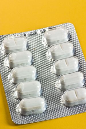 tablets on yellow background